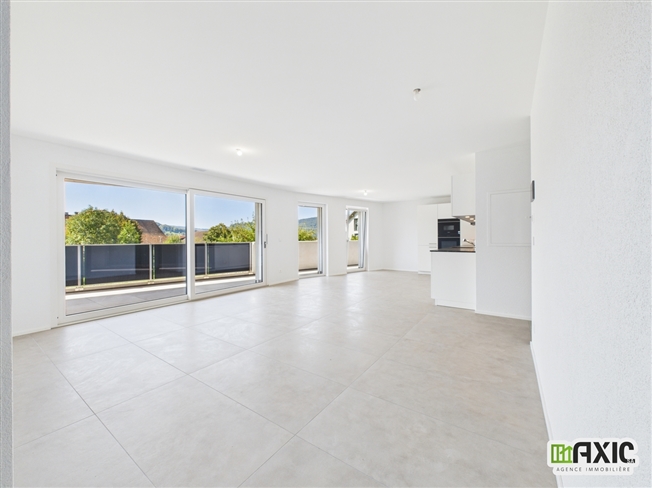 Rossemaison - Neue 4.5 Zimmer Minergie-P Wohnung mit Balkon -  Bild 1