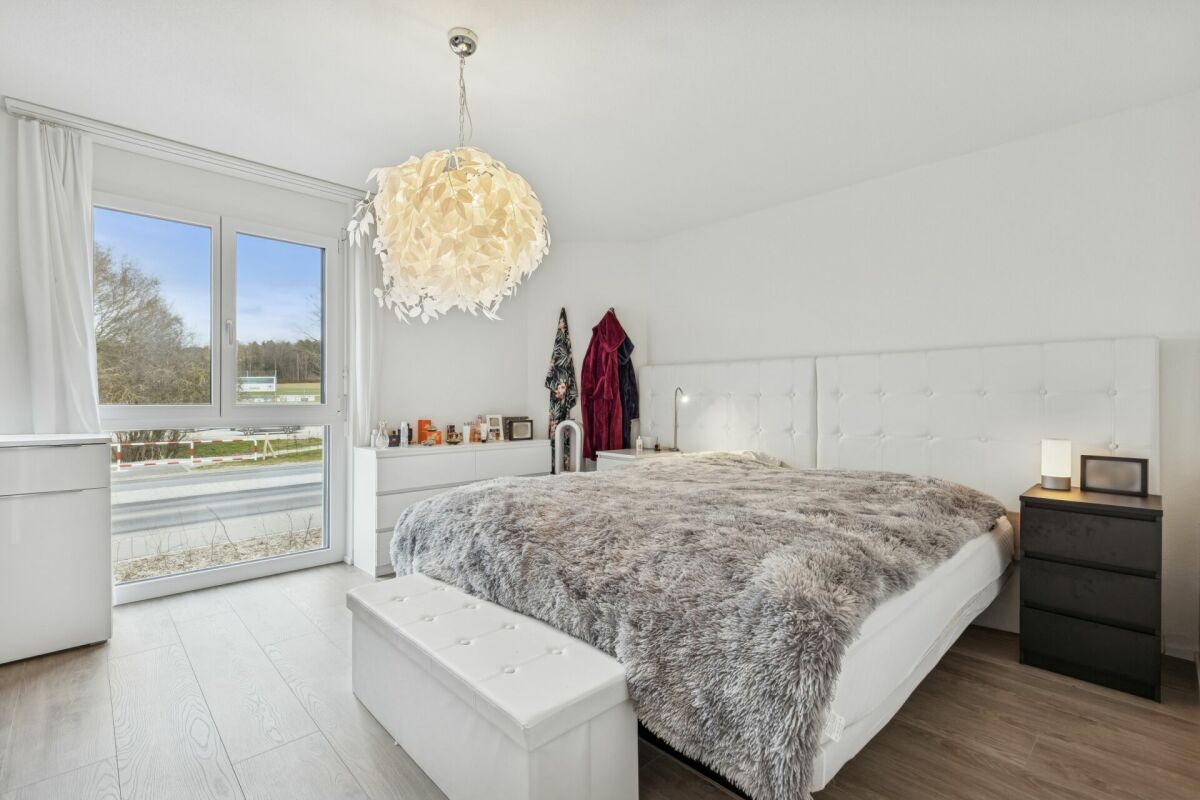 Moderne 5.5-Zimmer-Etagenwohnung mit Stil und Komfort - Zimmer
