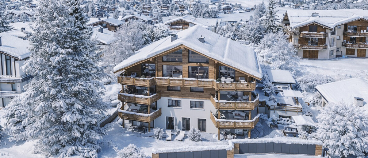 Klosters: Neubau Dachmaisonette mit edlem Interieur und Aussicht - EB157_Klosters_Haus