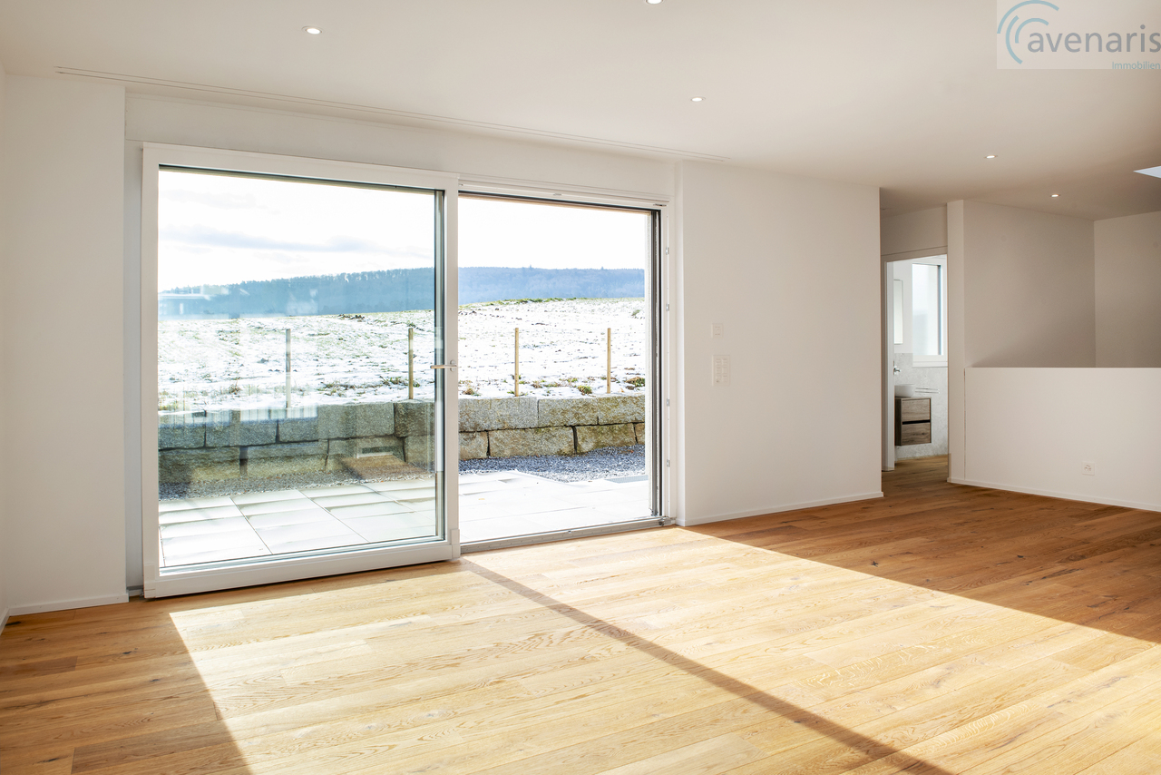 Neubau: Ein Doppeleinfamilienhaus ist noch frei - Wohnzimmer