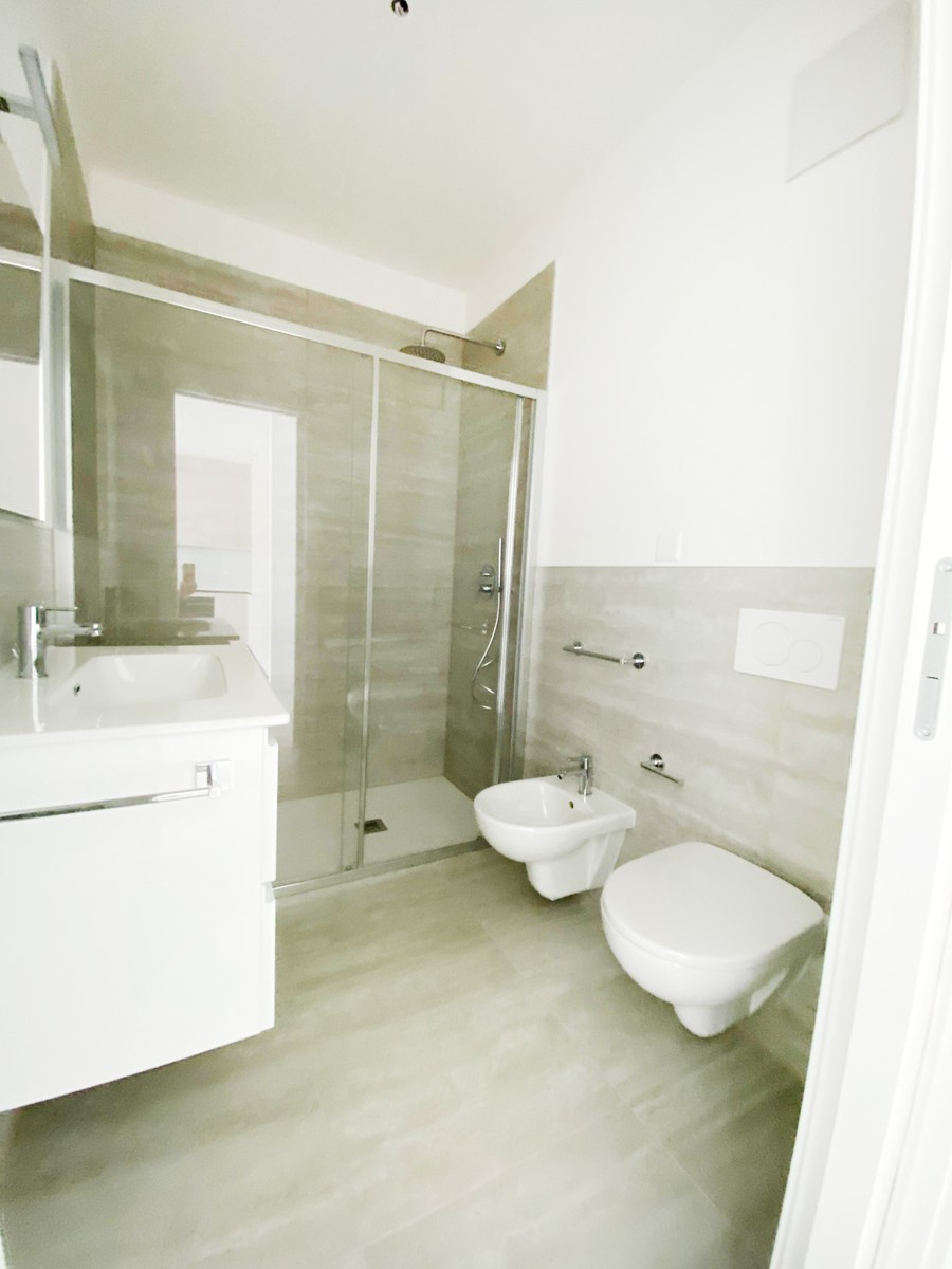 Elegante nuovo 2,5 locali di alto standing con giardino privato. -  Bild 4