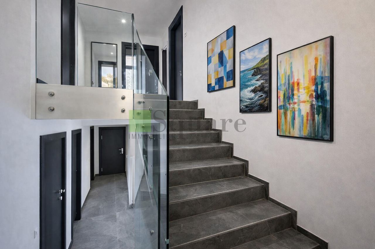 Villa jumelle contemporaine de 5.5 pièces avec une vue panorama - Bild 4