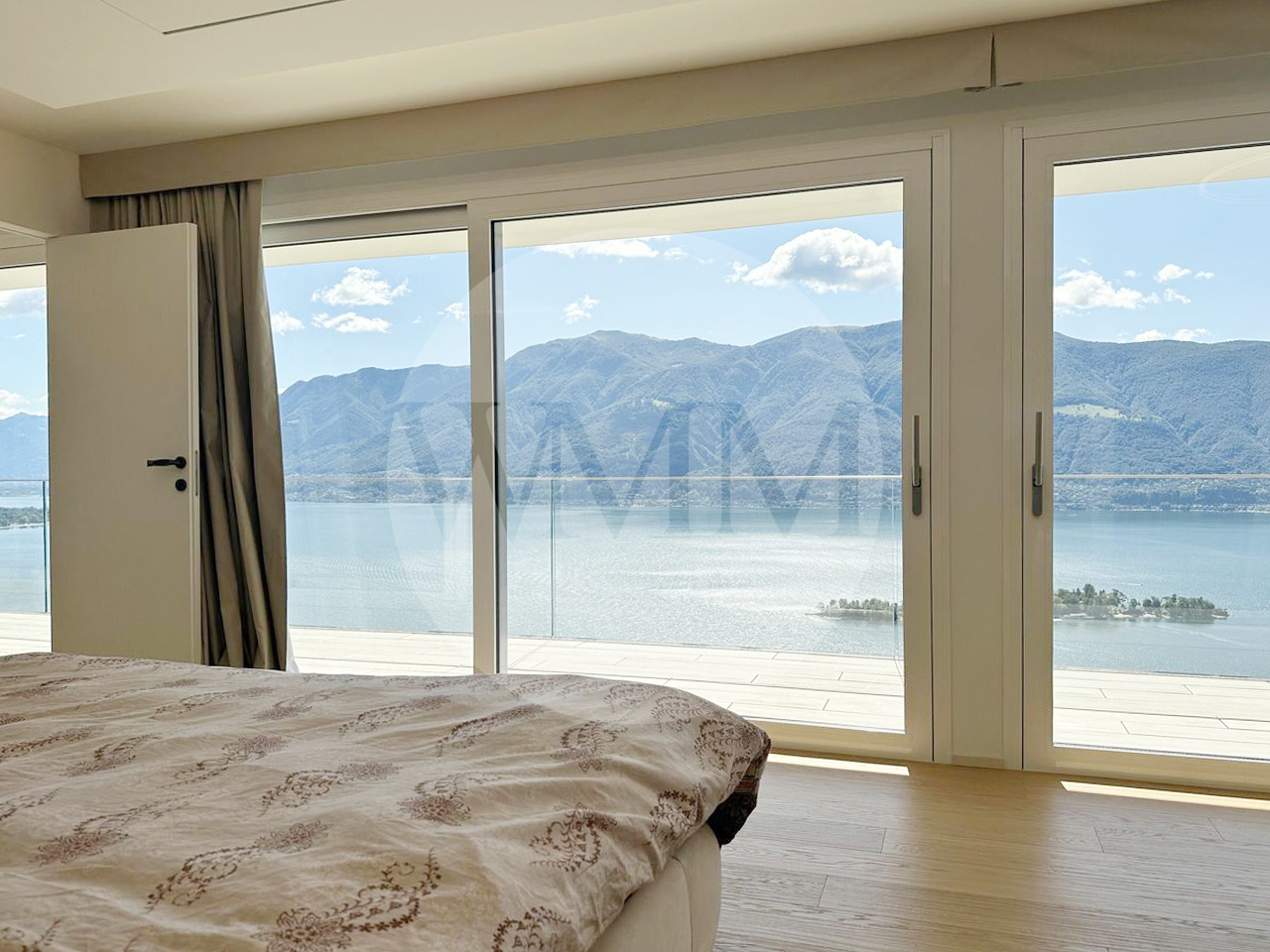 VILLA EXTRALUSSO CON IMPERDIBILE VISTA SULLE ISOLE DI BRISSAGO - Bild 8