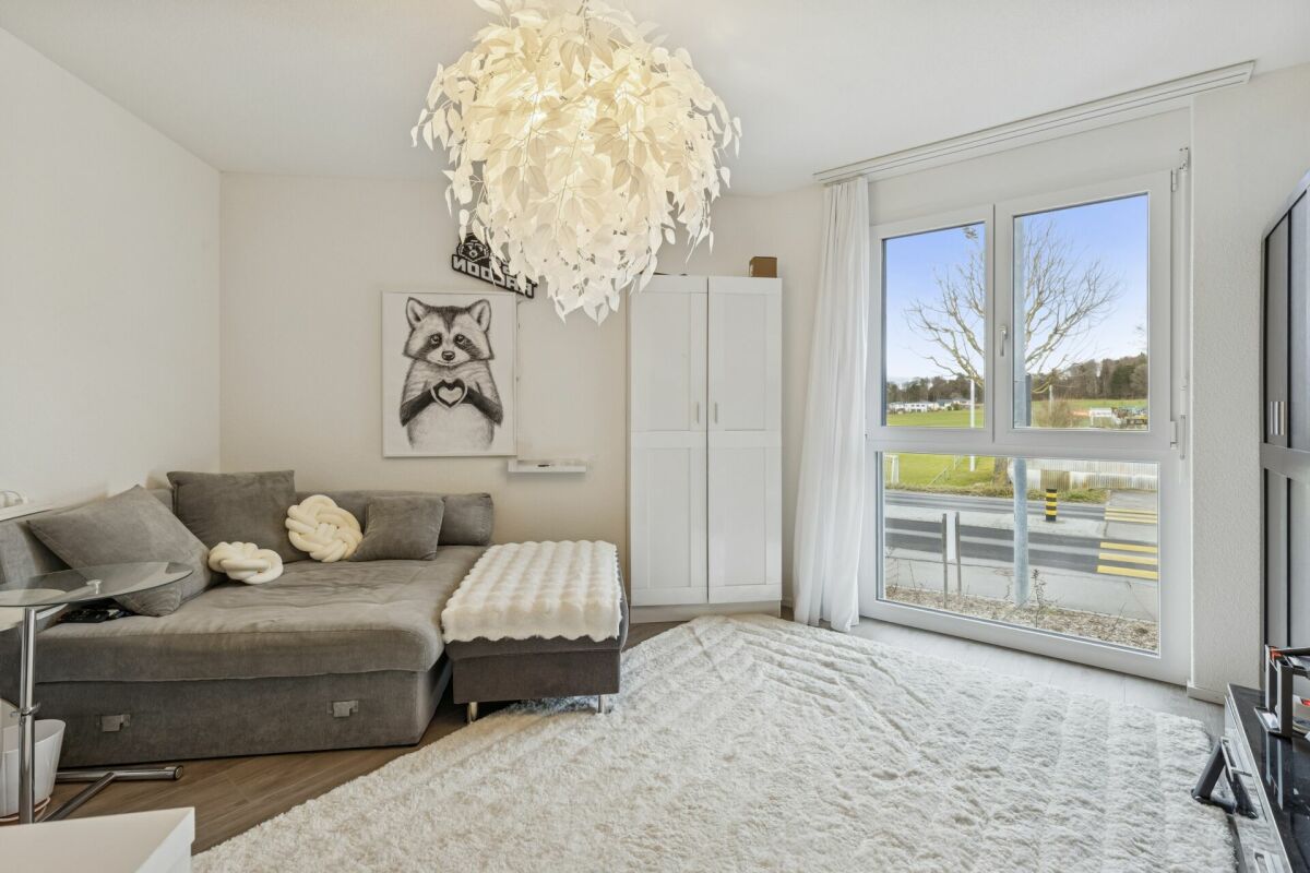 Moderne 5.5-Zimmer-Etagenwohnung mit Stil und Komfort - Zimmer