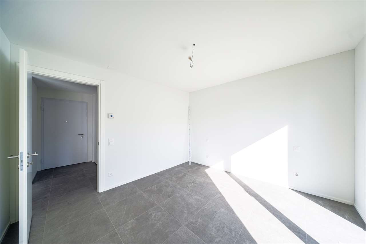 2.5 con giardino NUOVO Minusio vista lago - Bild 12