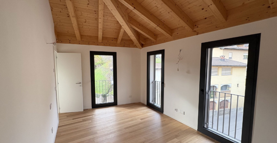 Attico Esclusivo con Vista Lago a Pura - Comfort Moderno in Posizione Idilliaca - Image 4