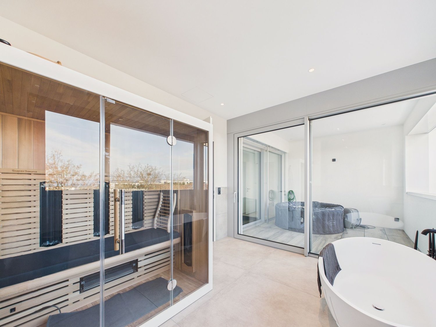 Exklusive 5.5-Zimmer-Neubau-Wohnung mit Kamin, Sauna und Seeblick in Bottighofen - Image 7