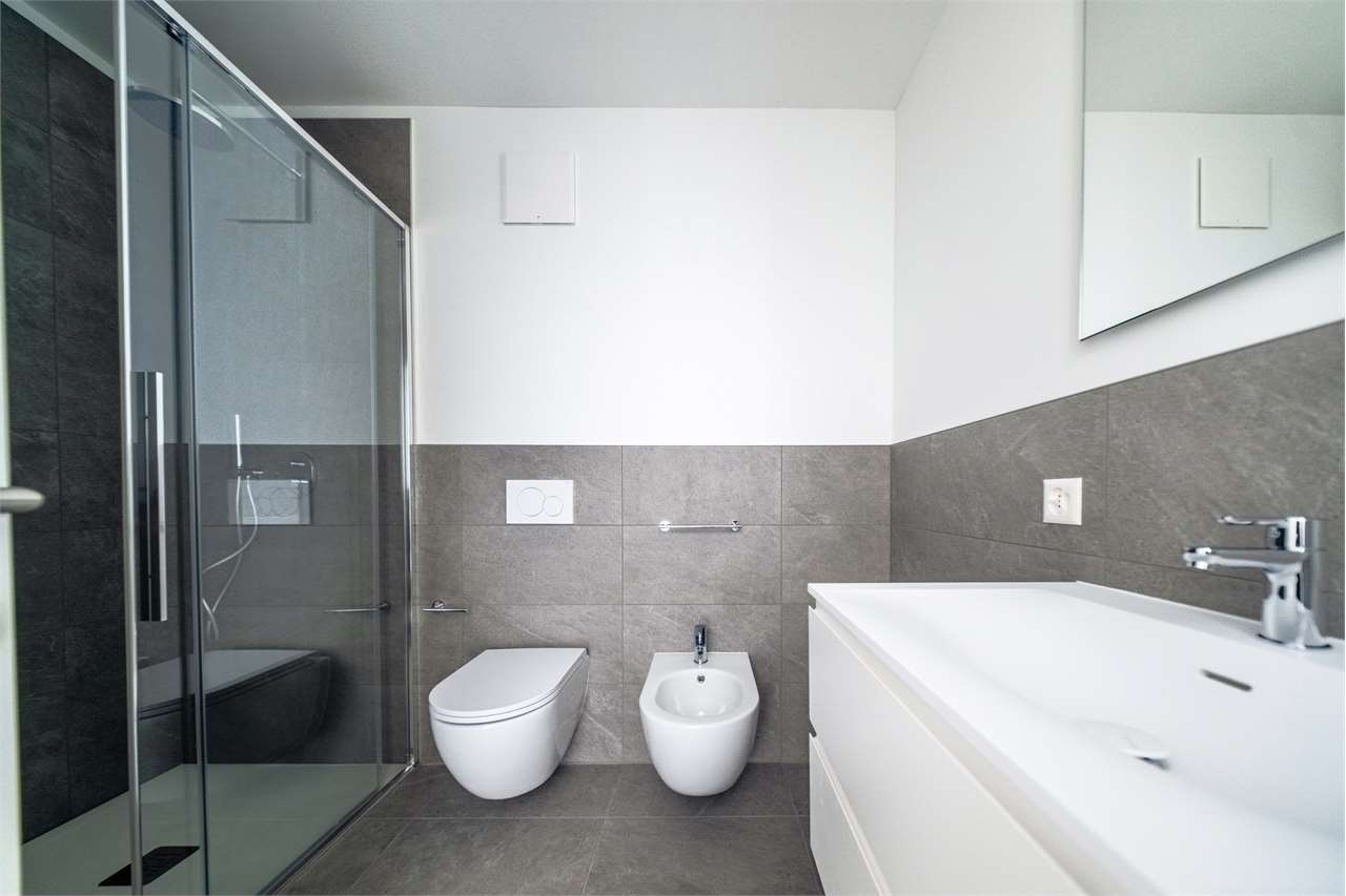 2.5 con giardino NUOVO Minusio vista lago - Bild 13