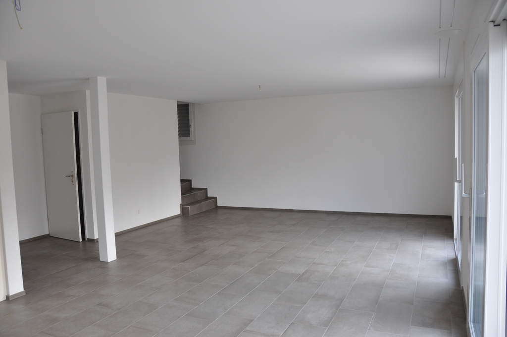 Gemütliches Einfamilienhaus mit grosszügigem Garten - Beispiel Wohnzimmer