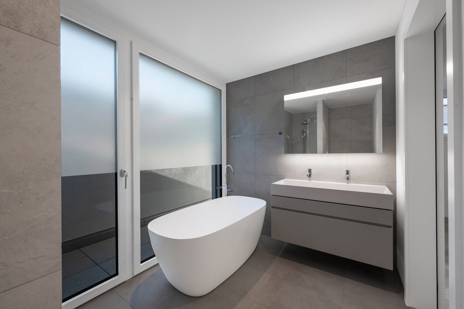 Ankommen. Aufatmen. Ein Jahr zinsfrei. - Badezimmer