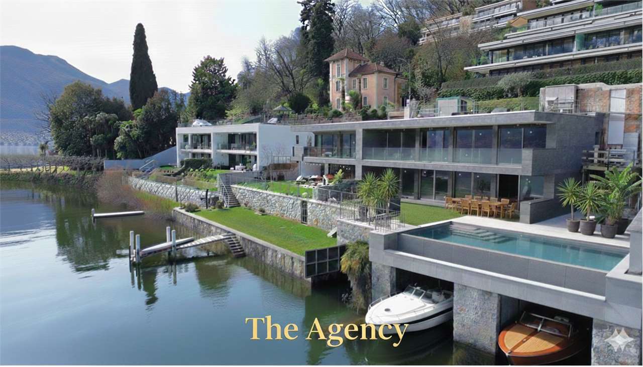 Magnifica villa moderna direttamente a lago - Bild 1