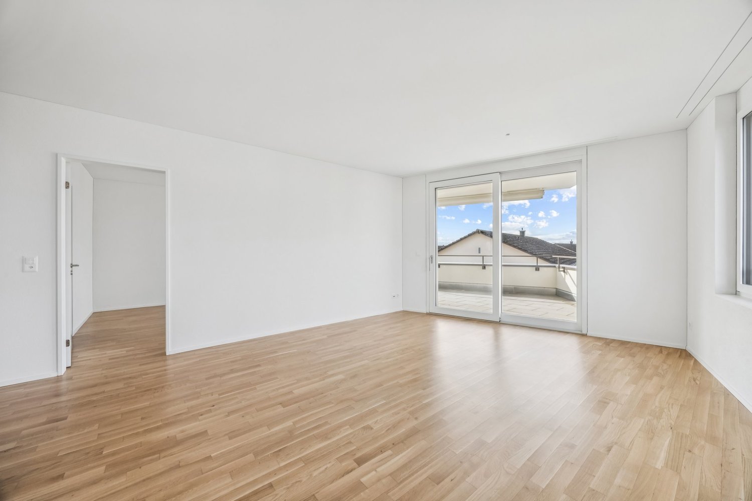 Neubauwohnung an traumhafter Lage direkt am Seeufer in Rapperswil-Jona - Wohnzimmer