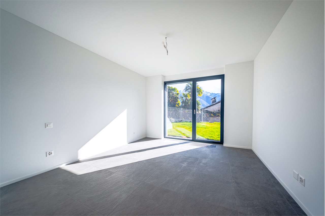 3.5 con giardino NUOVO  Minusio vista lago al PT - Bild 12