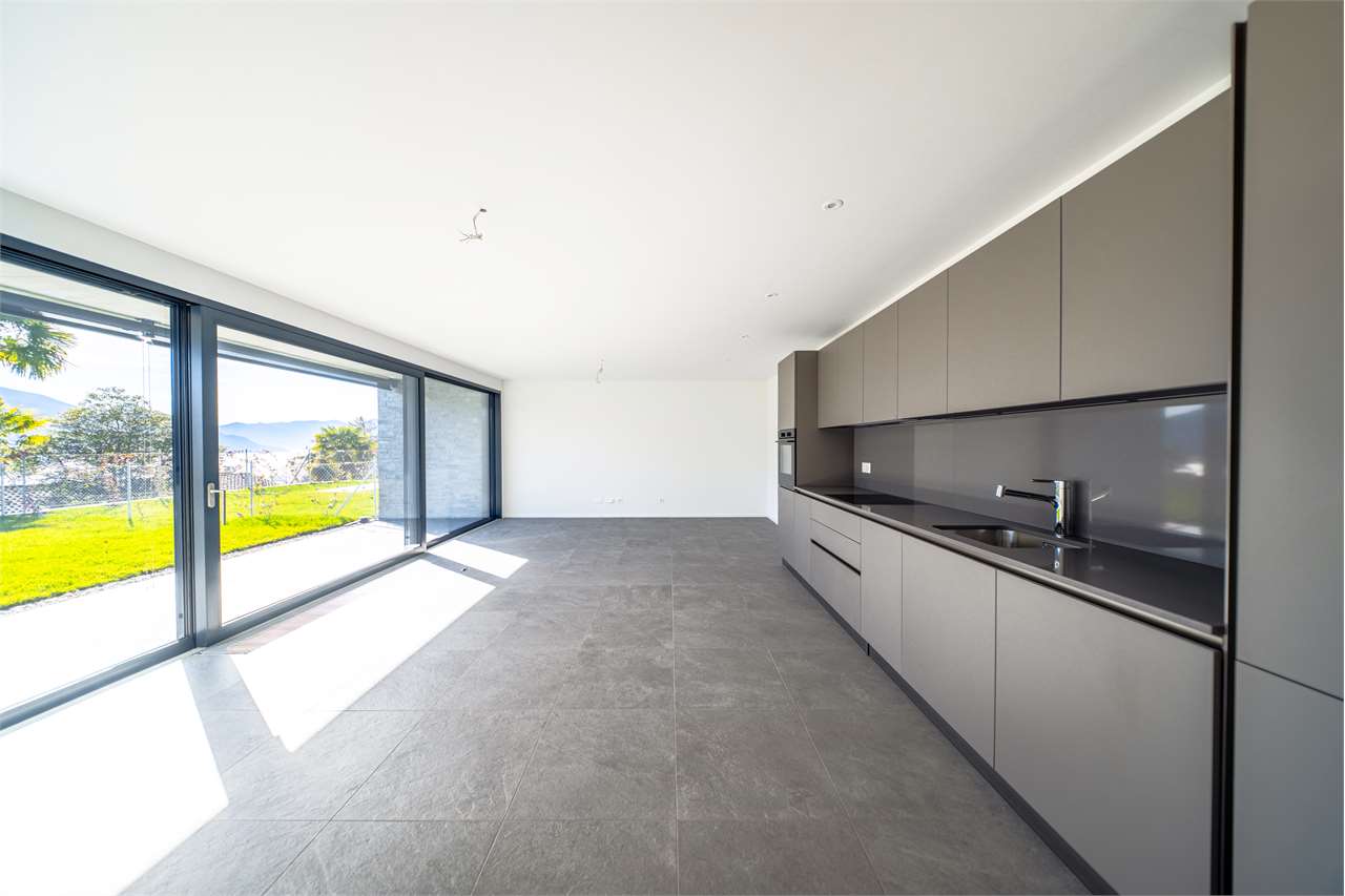 2.5 con giardino NUOVO Minusio vista lago - Bild 7