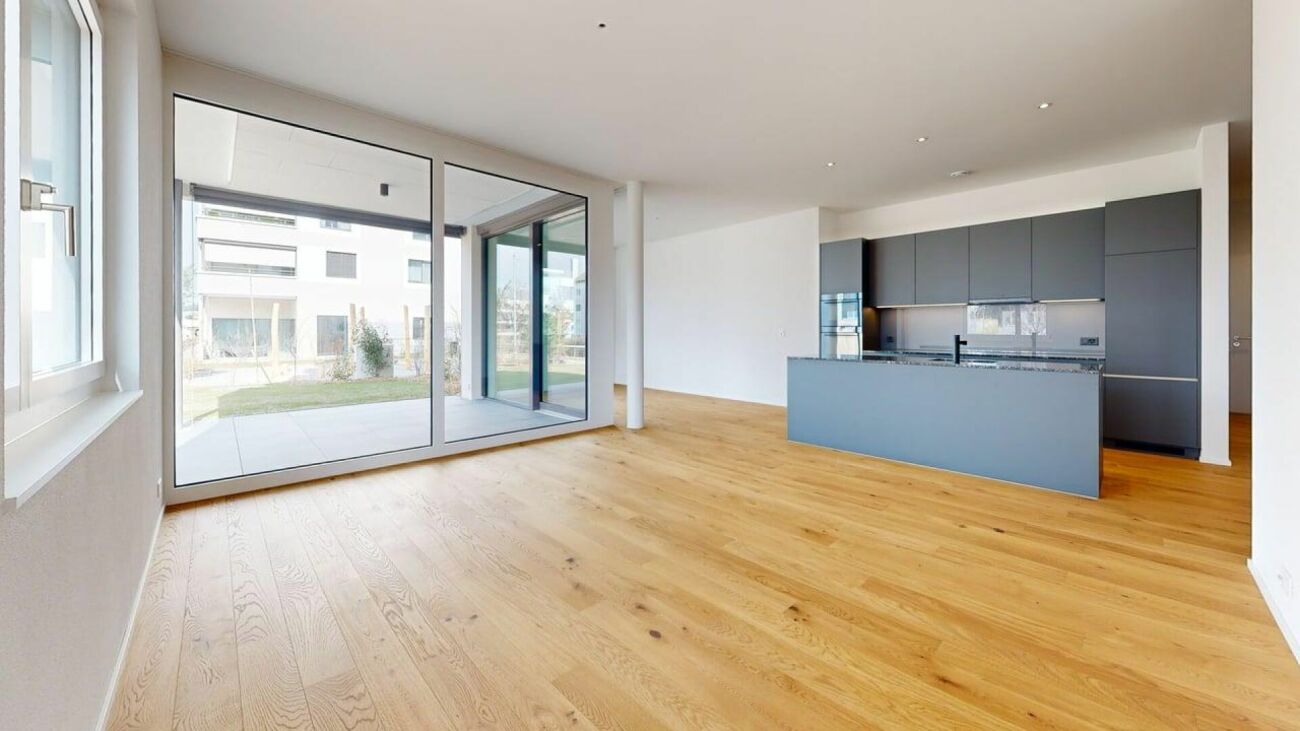 Exklusive 5.5-Zimmer-Gartenwohnung an bester Lage - Wohn-Essbereich mit Küche