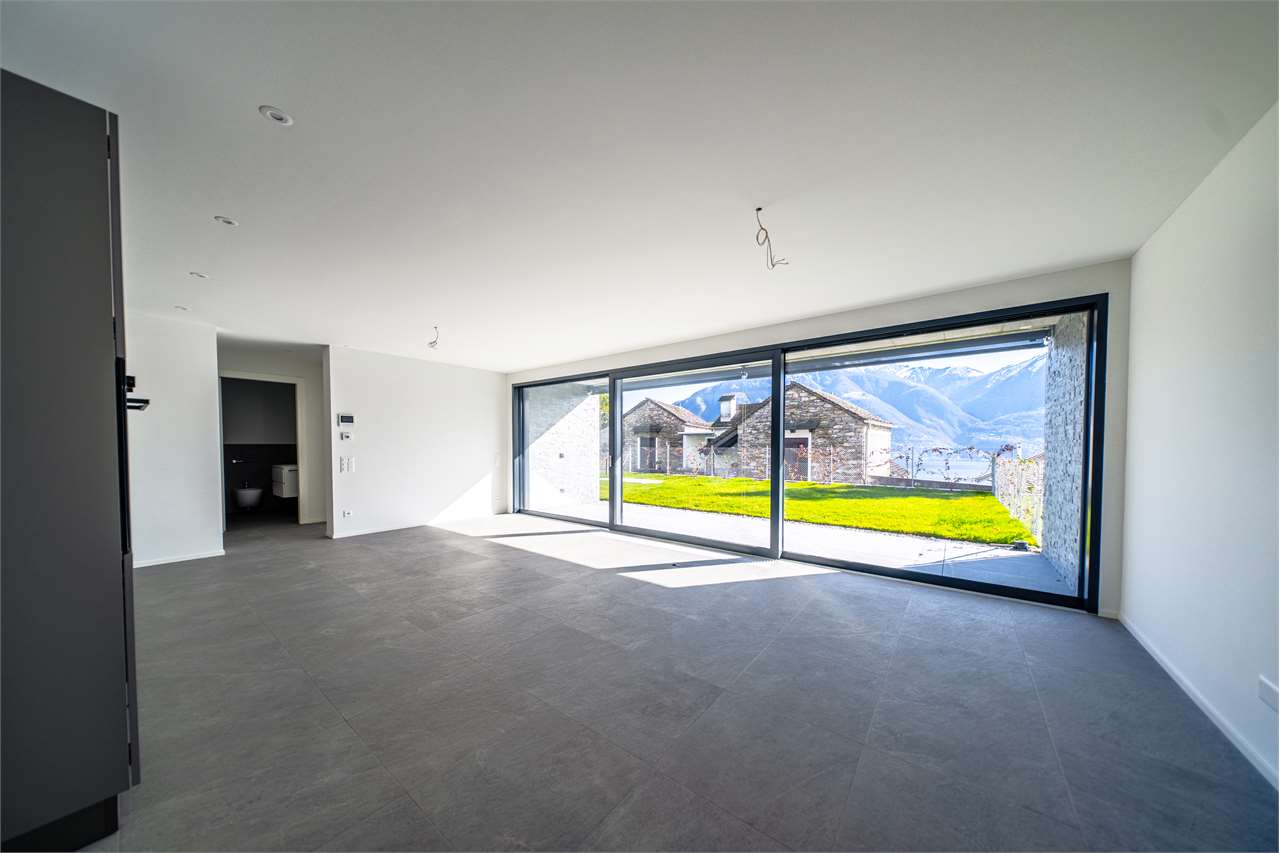 2.5 con giardino NUOVO Minusio vista lago - Bild 9