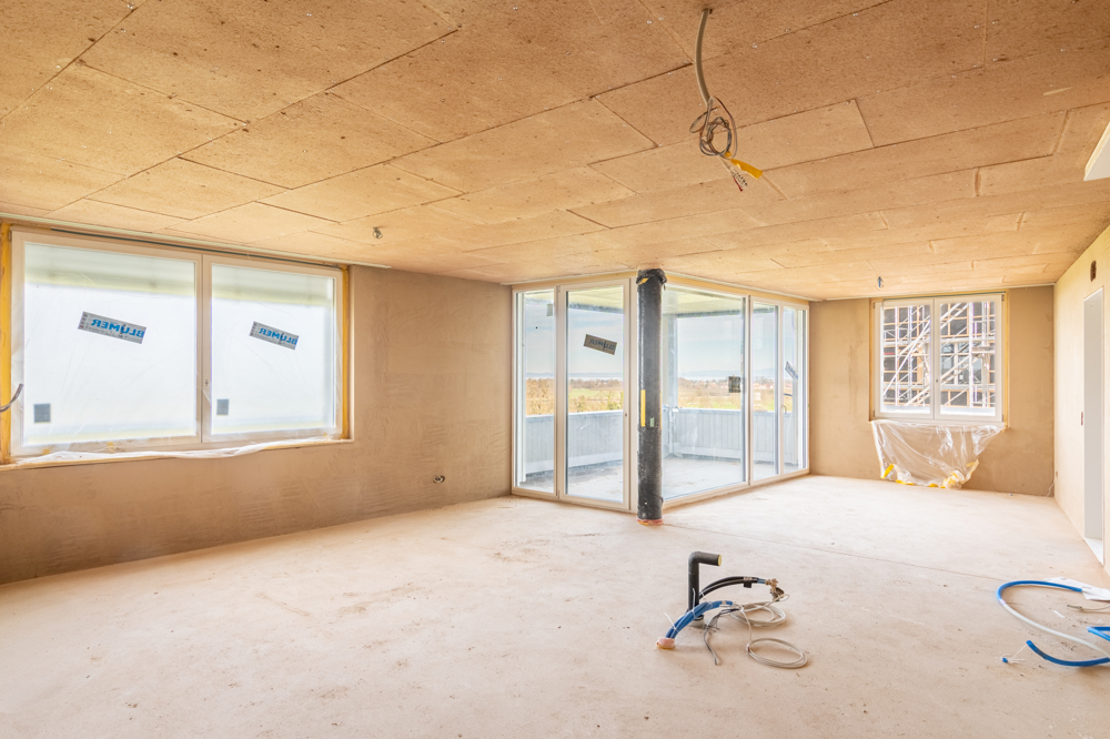 Nachhaltiger Wohntraum mit einzigartiger Seesicht - Wohn- & Essbereich