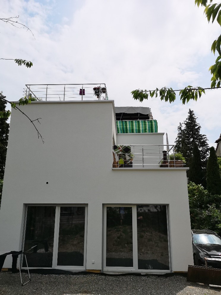 Altbau trifft Neubau: 4.5-Zimmer-Wohnung in Kreuzlingen mit Balkon und Parkplatz - Ansicht Anbau vom Garten