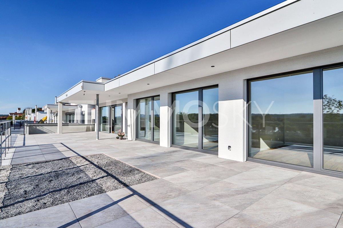 Eine Symphonie von modernem Wohnen und Natur - Sonnenterrasse