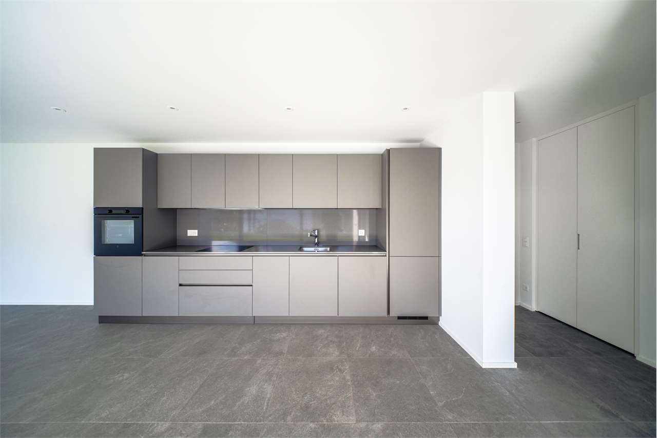 2.5 con giardino NUOVO Minusio vista lago - Bild 10